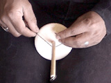 tying the leader on the spindle